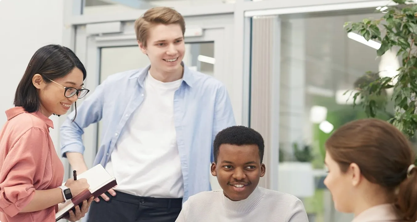 Software development team collaborating in a modern workspace