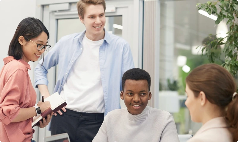 Software development team collaborating in a modern workspace